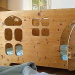 Dieses Kinderbett ist ein Spielhäuschen